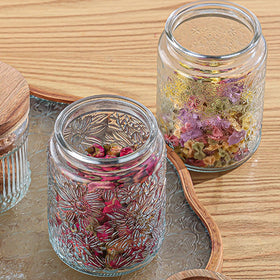 Yoqelt vintage glass jar with window-carving lid elevates storage visibility and style.