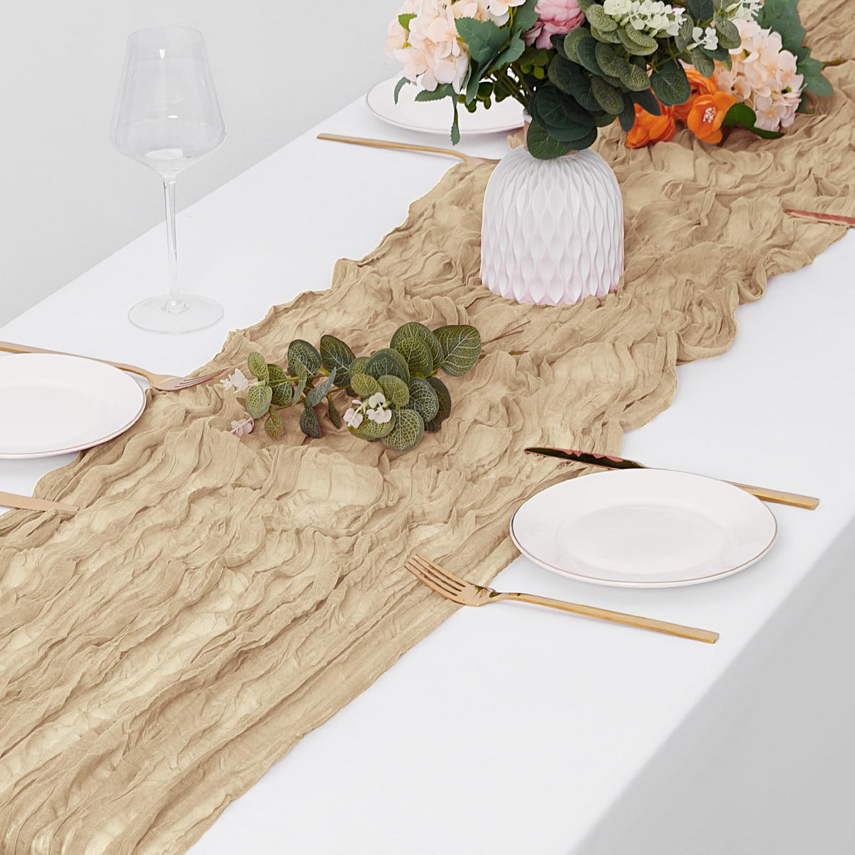 Rustic wedding arch decor using Yorcari beige cheesecloth runner
