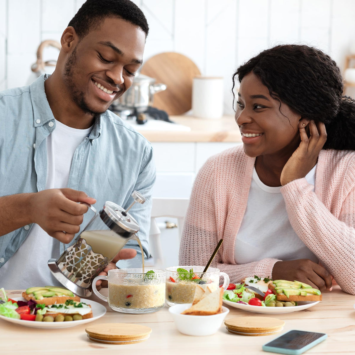 YORY stainless steel spoon pairs with glass containers for safe scooping.
