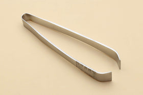 Yoshihiro sushi garnishing tool enhances delicate plating with control.