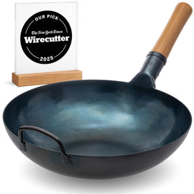 YOSUKATA 13.5-inch blue carbon steel wok with flat bottom for high-heat stir-frying.