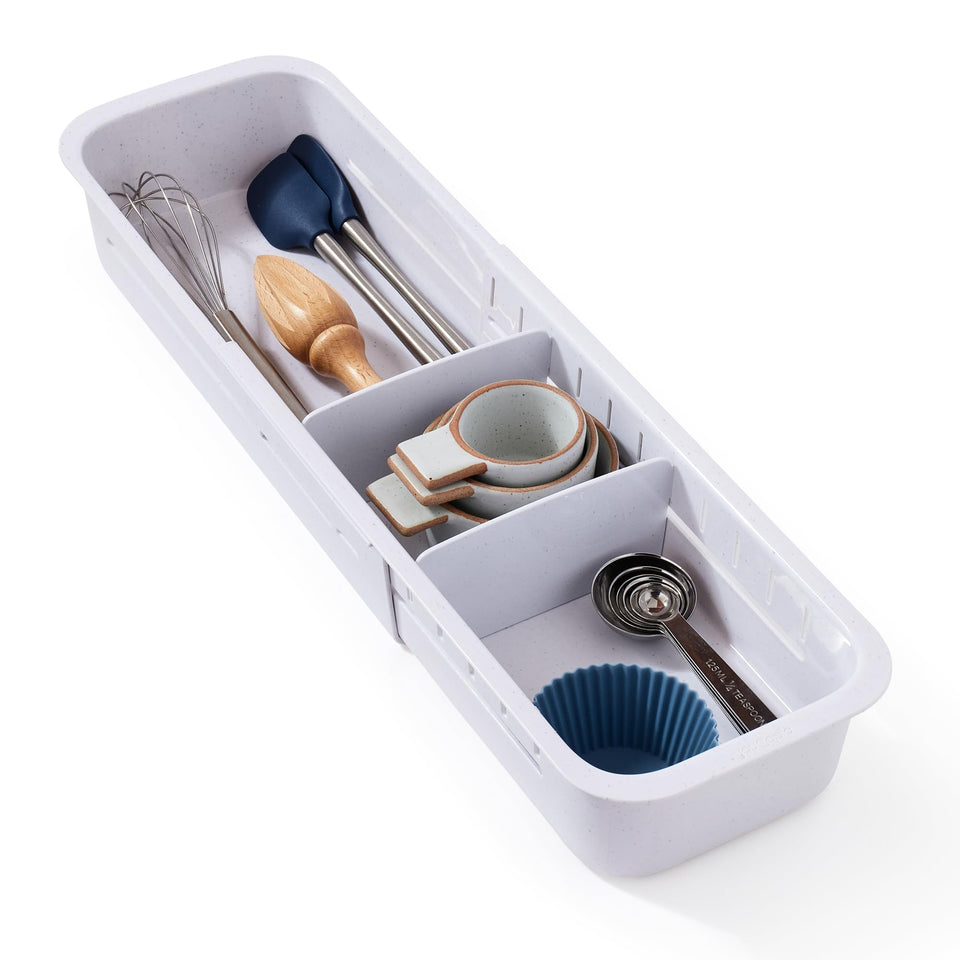 YouCopia DrawerFit extended in a deep drawer with extra upper storage.