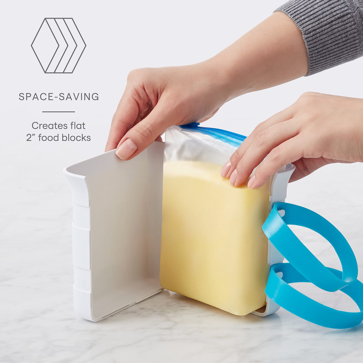 YouCopia FreezeUp vertical filling keeps bags open for neat filling.