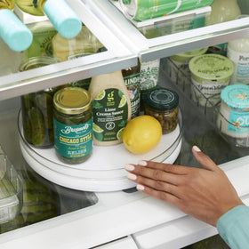 YouCopia FridgeView on a shelf with items loaded and ready to spin.