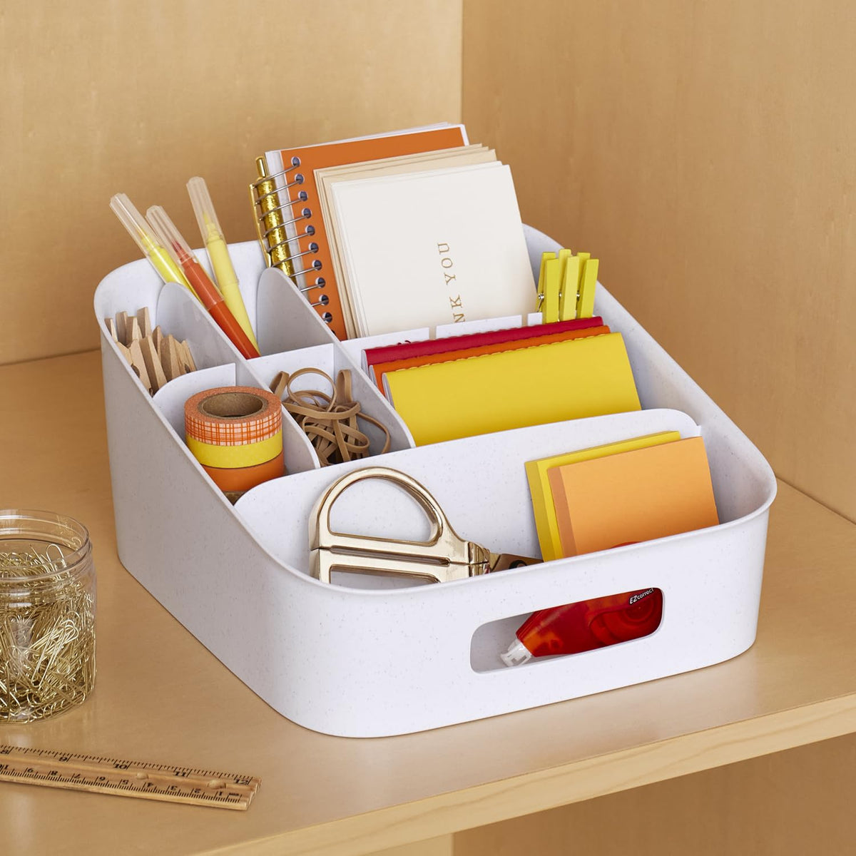 YouCopia ShelfBin speckled white finish complements kitchen decor.