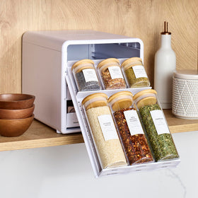 YouCopia SpiceStack accommodates different bottle shapes for flexible storage