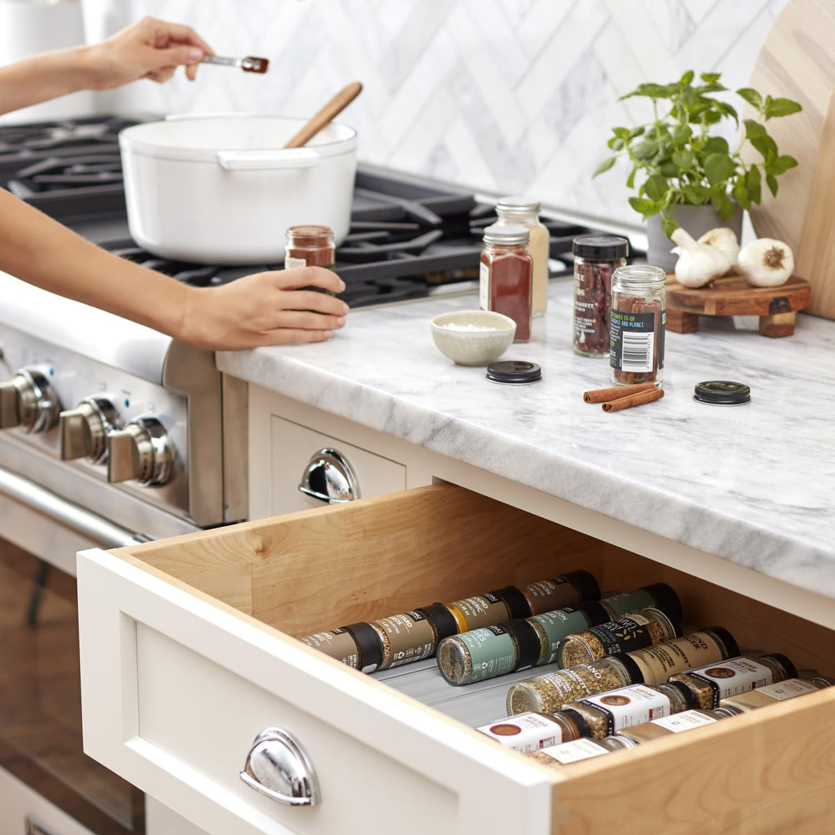 SpiceLiner supports 30+ bottles for easy accessibility in the drawer