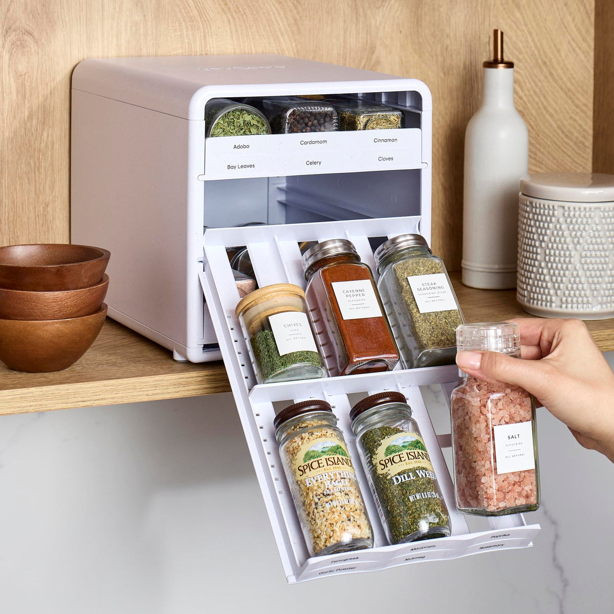 YouCopia SpiceStack stored in a cabinet showing efficient pantry organization