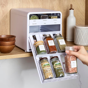 YouCopia SpiceStack stored in a cabinet showing efficient pantry organization