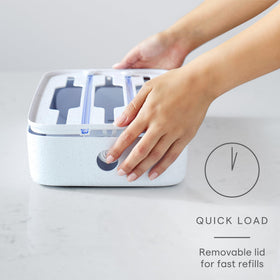 YouCopia StoraRoll wrap dispenser with adjustable dividers keeping rolls neatly in place