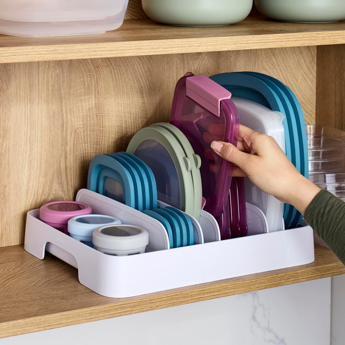 YouCopia StoraLid built-in handles facilitate easy sliding.