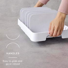 Eight adjustable dividers organize lids of different shapes for easy access.