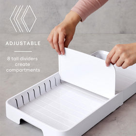 YouCopia StoraLid expands to fit larger cabinets for more lid storage.