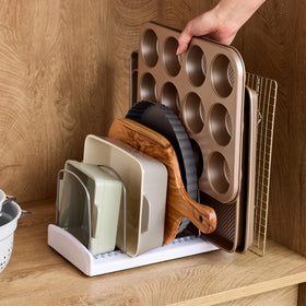 YouCopia StoreMore Bakeware Rack in use demonstrates easy access to pans and lids.
