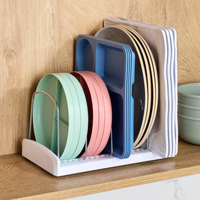 YouCopia StoreMore Bakeware Rack open-base design prevents lids from rolling.