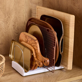 YouCopia StoreMore Bakeware Rack non-slip feet keep items secure.