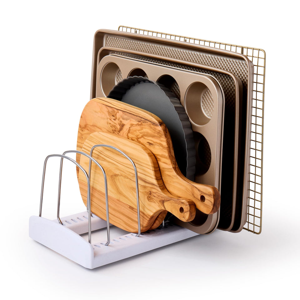 YouCopia StoreMore Bakeware Rack side view highlights upright storage for pans and lids.