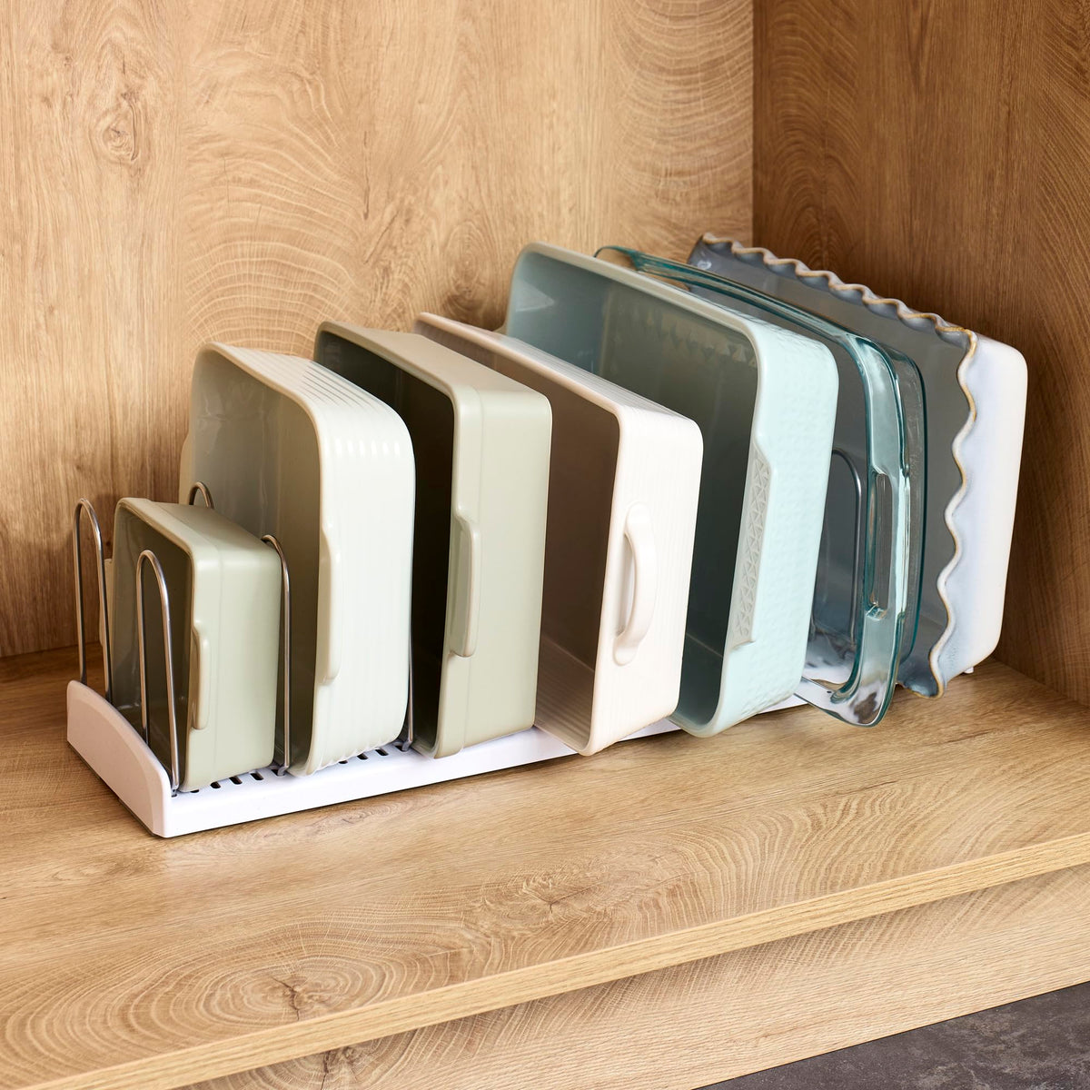 YouCopia StoreMore pans and lids organized neatly in a cabinet