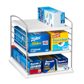 YouCopia UpSpace foil wrap organizer keeping rolls neatly accessible in the cabinet.