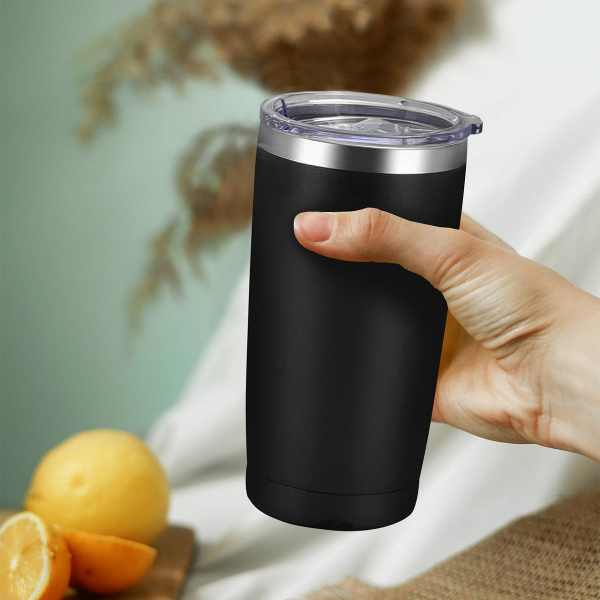 YOUKE OLA vacuum-insulated tumbler resists chips and keeps drinks at temperature.