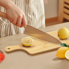 YOUKE OLA multiuse bamboo board for cutting bread, cheese, meats, vegetables, and fruit.