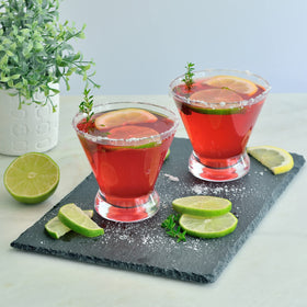 Youngever stemless martini glasses in action during a poolside gathering.