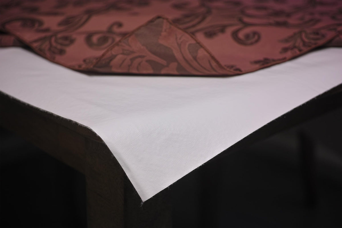 Yourtablecloth Deluxe 52x90 rectangle white table pad shields dining surfaces during meals.