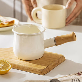 YumCute Home enamel milk pot chili red color in kitchen setting.