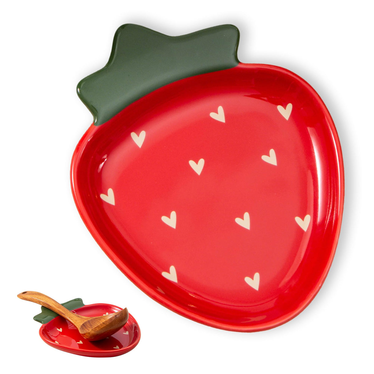 YumiPLUS ceramic strawberry spoon rest sits on the counter to keep utensils organized.