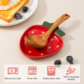 YumiPLUS porcelain strawberry spoon rest adds a touch of elegance to counters.