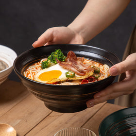 YUN TAO bowls feature a vibrant multicolor glaze for versatile table styling.