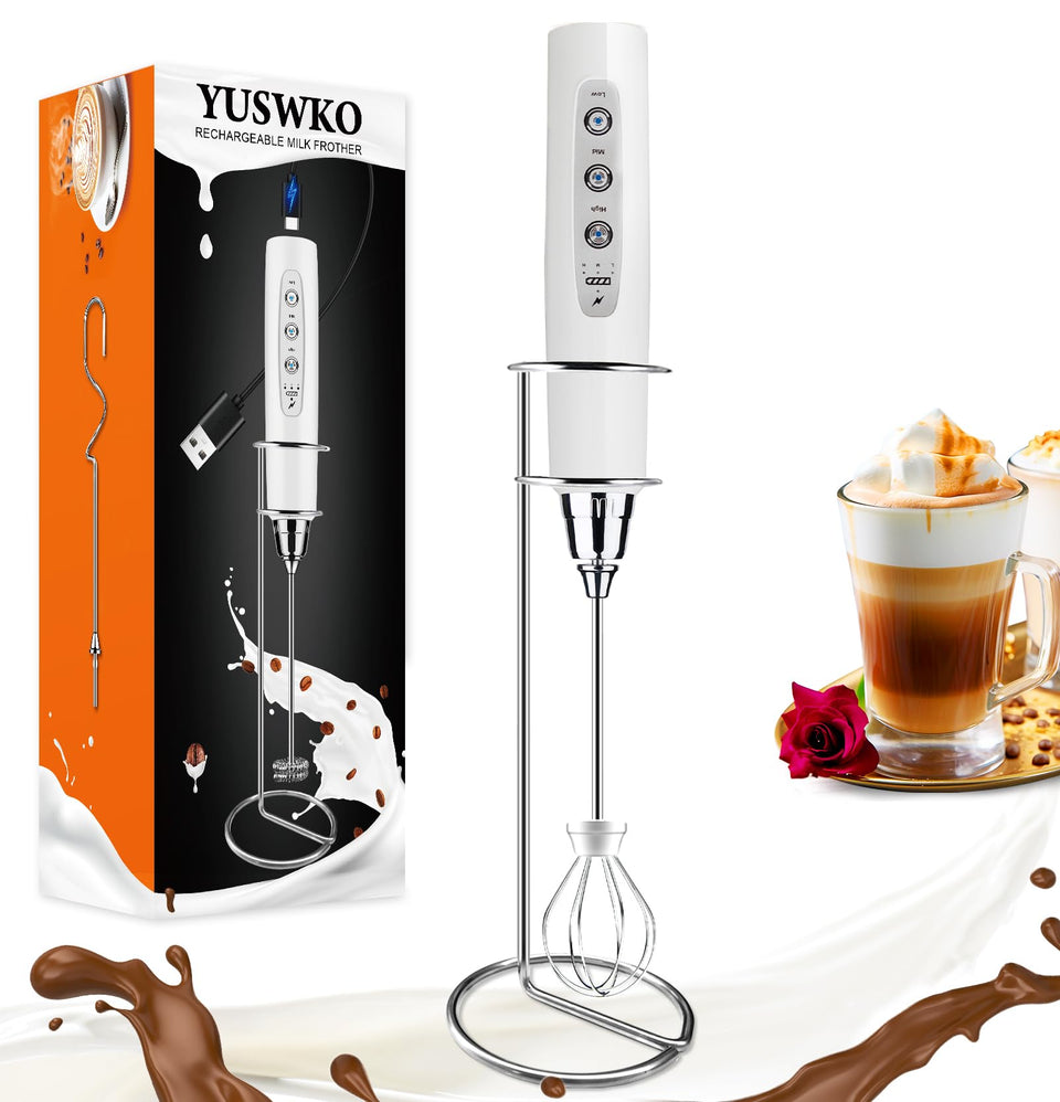 YUSWKO white handheld milk frother with stand on a clean counter.