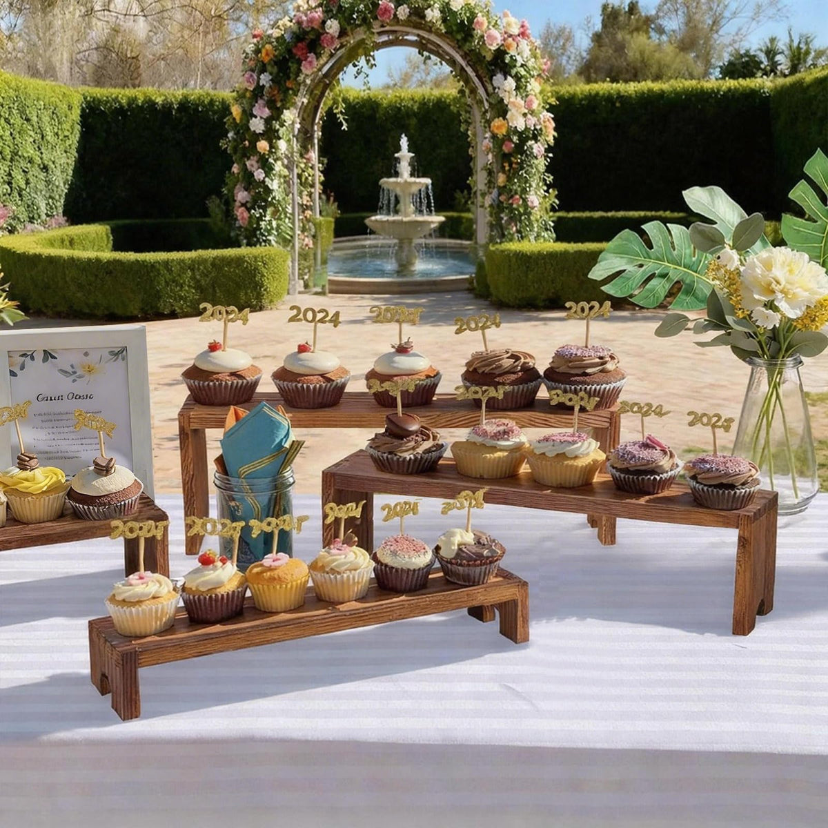 YUZUKYAUY cupcake stand holding cupcakes and small treats on a dessert table
