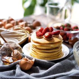 YYGMSS buffet and dessert station with wooden honey dippers.