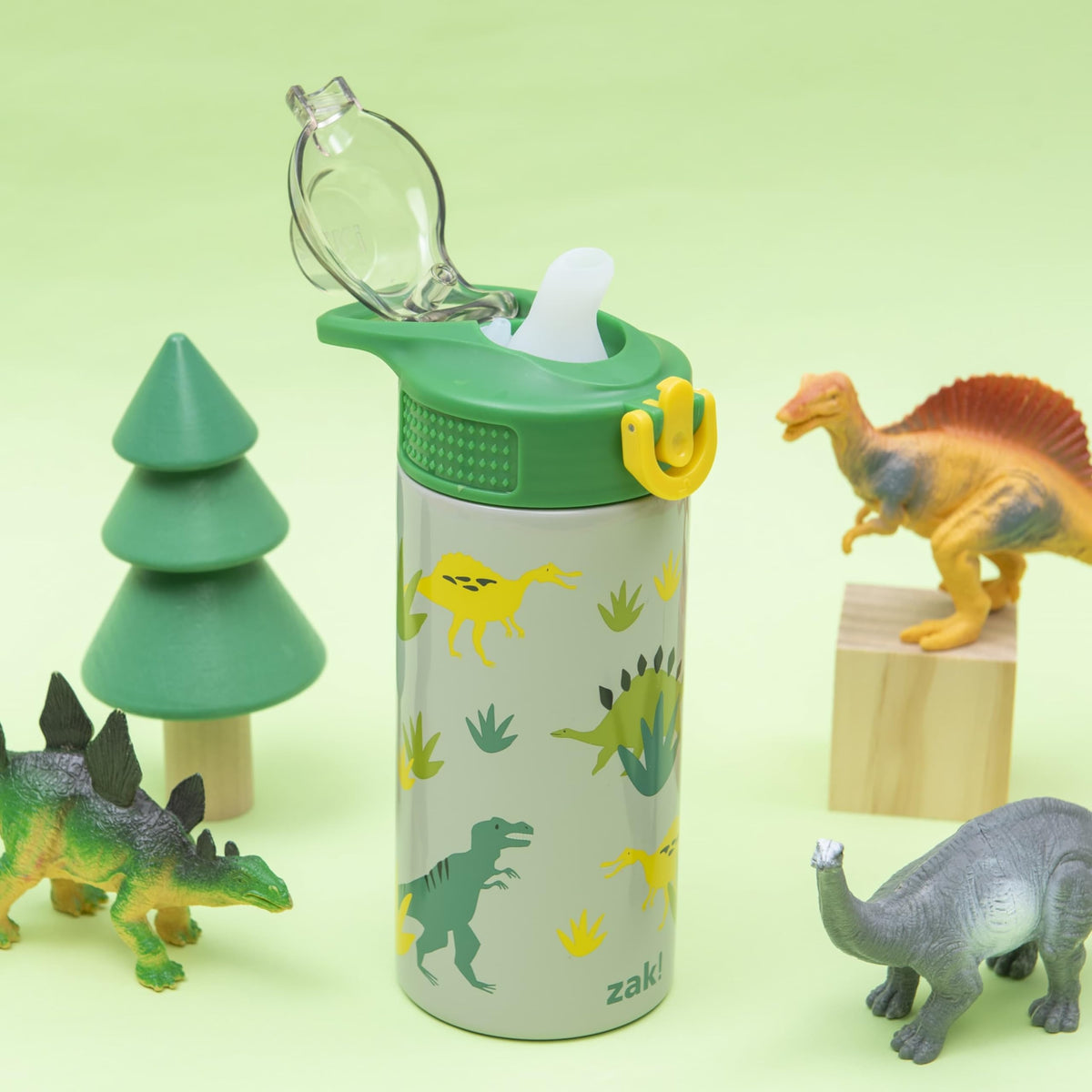 Zak Designs Sage Dino spout cover keeps surfaces clean during travel.