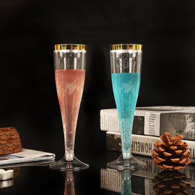 Zcaukya wedding reception display using gold-rim flutes