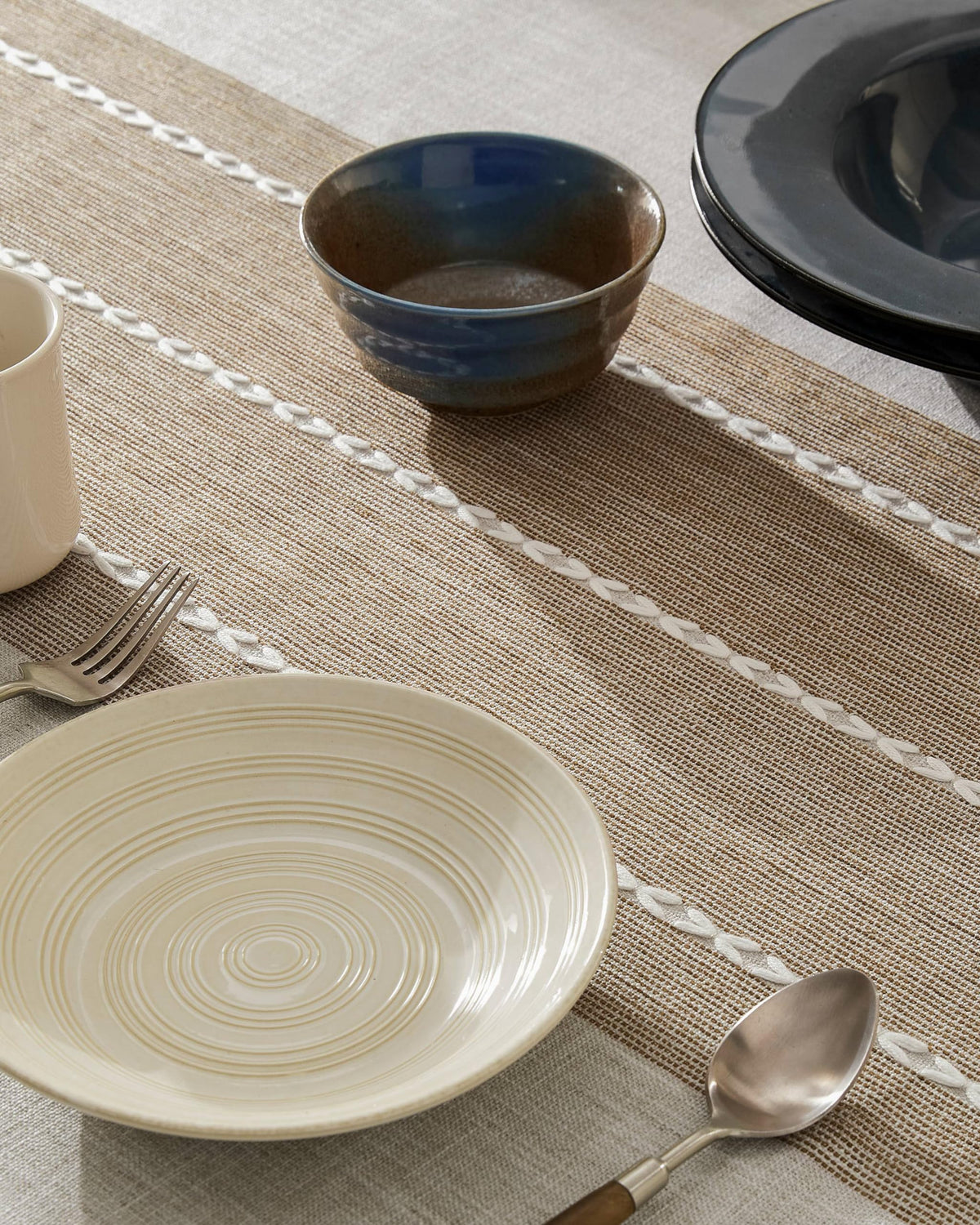 ZeeMart cloth displayed in a farmhouse dining setup with warm tones