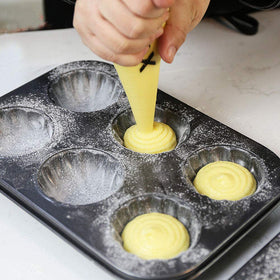ZEENEEK madeleines in oven showing even heat distribution.