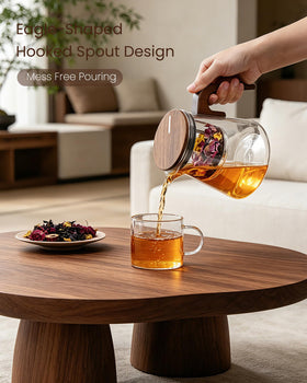 ZENS glass infuser with stainless steel filter, a clean tea strainer close-up.