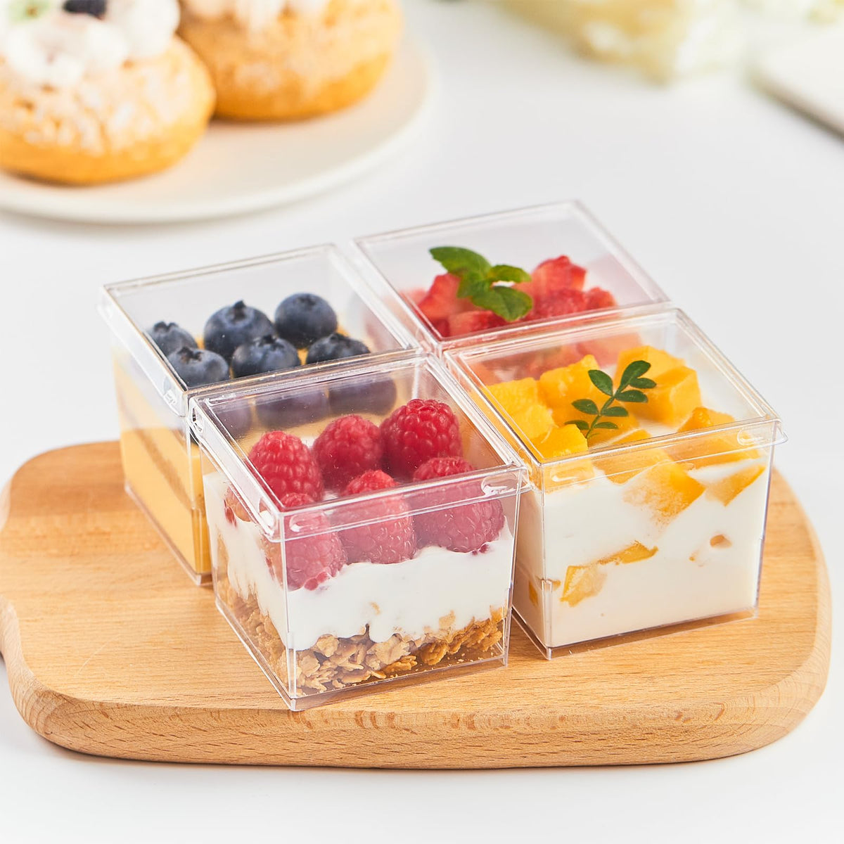 Zezzxu 50-pack set includes cups lids and spoons for events