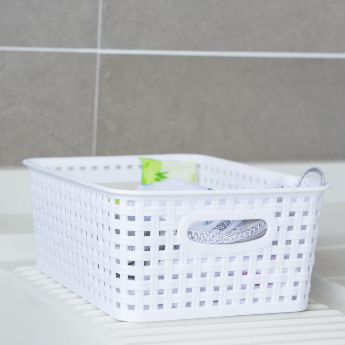 ZHENFAN basket in bathroom for toiletries and cosmetics storage.
