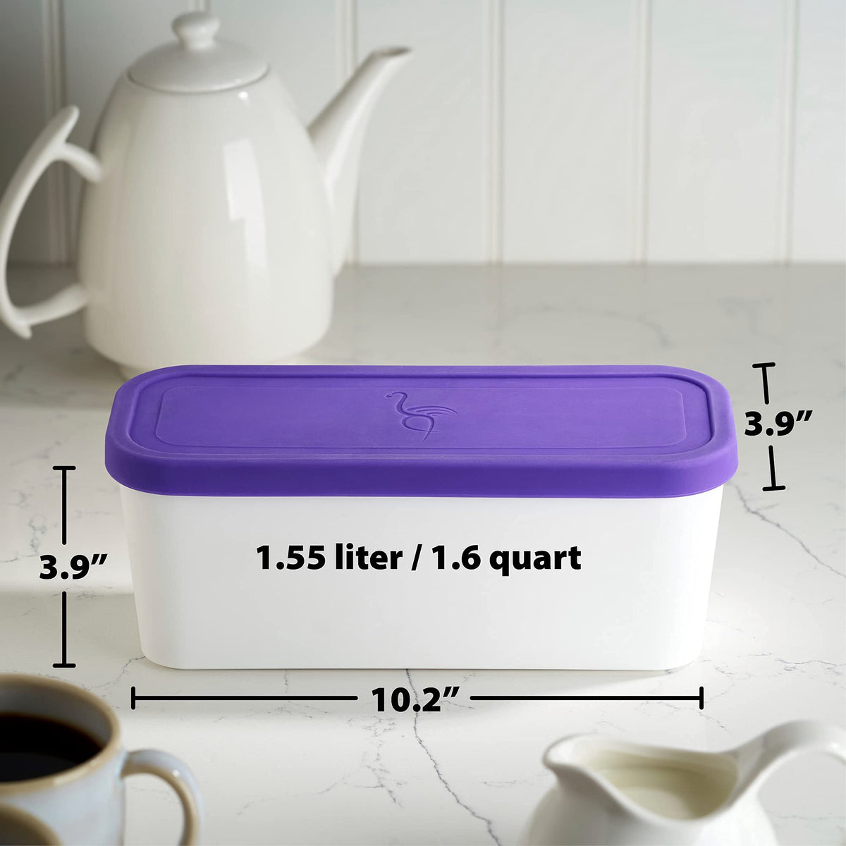 Organized freezer with ZICOTO tubs and labels helping find flavors quickly.