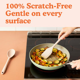 Ziruma scratch-free silicone spoon near non-stick pan.