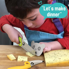 ChefPuppy dog knife highlights playful training for safe slicing.