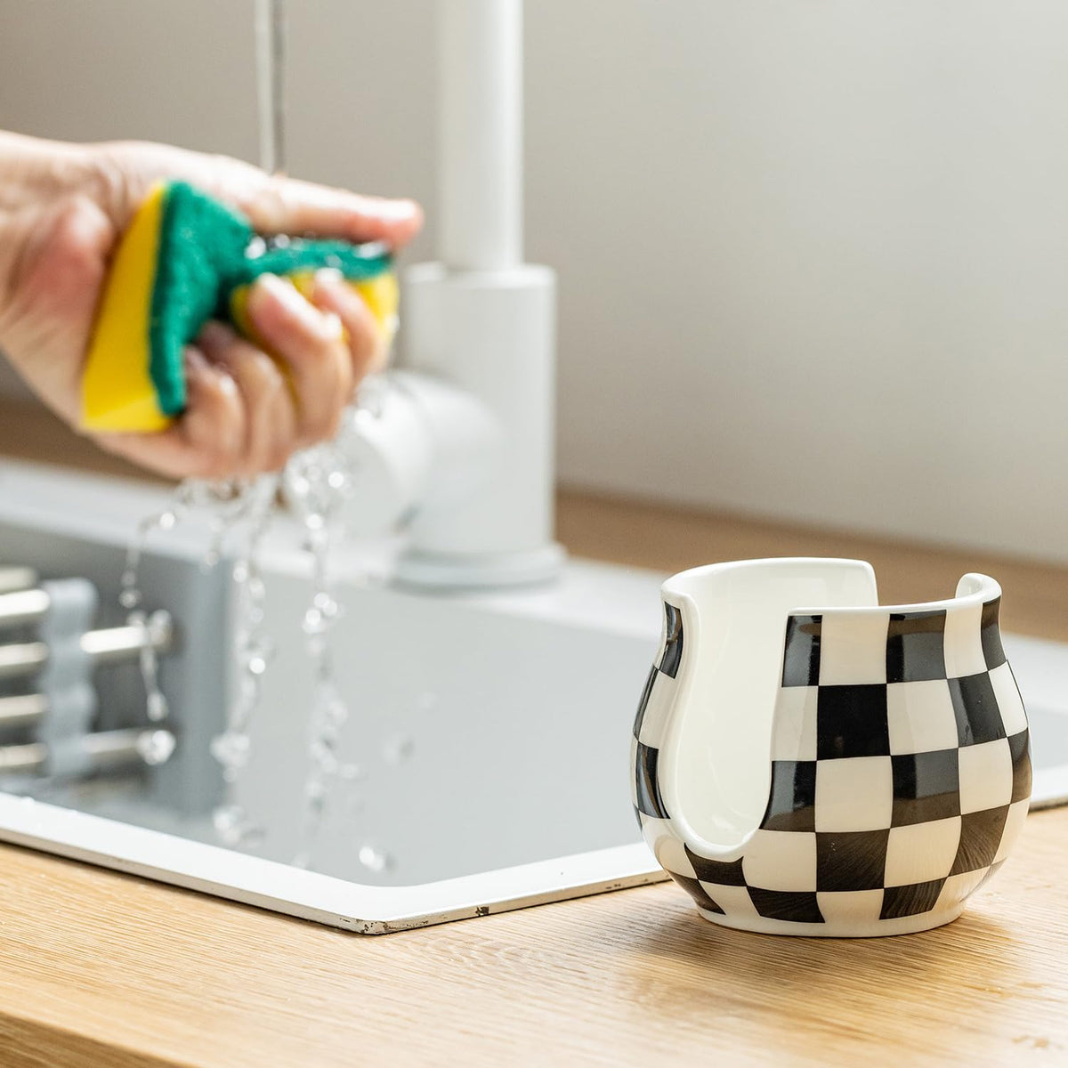 Zoeeker compact holder fits small spaces in kitchen or bath.