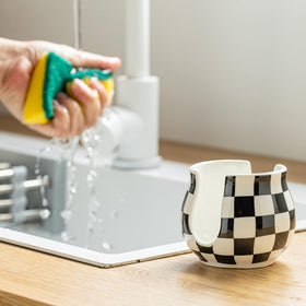 Zoeeker compact holder fits small spaces in kitchen or bath.