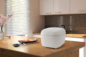 Zojirushi NL-EAC10WA detachable inner lid for thorough washing after cooking.