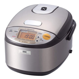 Zojirushi NP-GBC05XT induction heating rice cooker with 3-cup capacity for fluffy results.