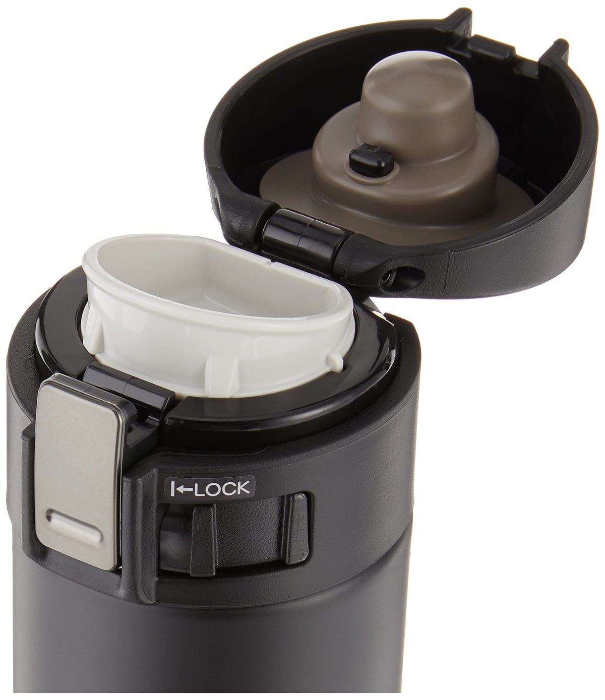 Zojirushi mug lid showing secure flip seal and safety lock for spill prevention.
