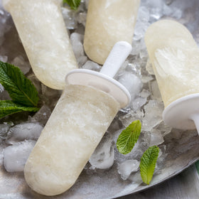 ZOKU Classic Pop Molds drip guards preventing mess and drips during handling.
